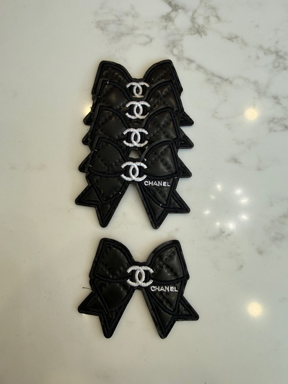 Hand Crafted Iron On Patch! Black Bow Patch with White Interlocking Emblem